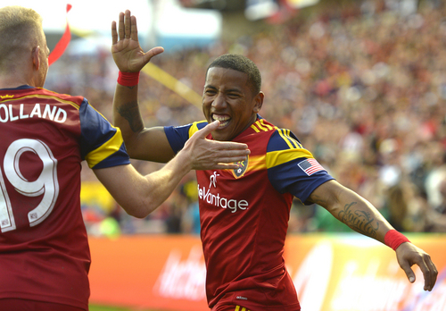 Rick Egan  |  The Salt Lake Tribune

Real Salt Lake midfielder Luke Mulholland (19) congratulate Joao Plata (8) after Plata's goal in the first period for Salt Lake, in MLS action, Real Salt Lake vs. The Colorado Rapids, at Rio Tinto Stadium, Saturday, May 17, 2014.