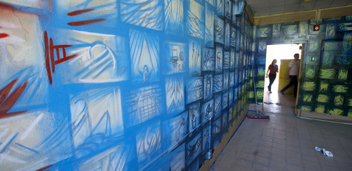 Steve Griffin  |  The Salt Lake Tribune


Artwork covers the walls in a class room inside the old Granite High School building in Salt Lake City, Utah Thursday, May 15, 2014.  The old building will house "Dreamathon," an interactive art exhibit that utilizes murals, photography, music, writing and storytelling to empower visitors to discover and live their dreams. Over 150 artisans from the local community have joined together to create a landscape of dreams by transforming the main section of the historic building.