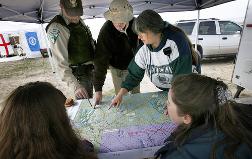 Scott Sommerdorf  |  The Salt Lake Tribune
Searchers coordinate at the command post with Ray Kelsey of the BLM, center, top, as they plan to scour the areas in and around Simpson Springs Saturday. The day-long effort turned up no trace of Susan Powell.
