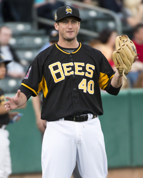 Rick Egan  |  The Salt Lake Tribune

David Freese play 3rd base for the Salt Lake Bees, in PCL action, Monday, May 19, 2014