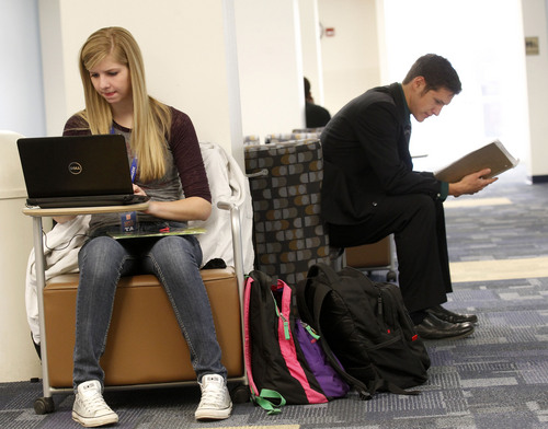 Al Hartmann  |  The Salt Lake Tribune
Students Kaylene Finch, left, and Geoff Canaan, study in a lounge in the classroom building at Snow College. New enrollment projections place Snow as the fastest-growing school in the state over the next decade. File photo.