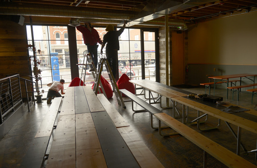 Rick Egan  |  The Salt Lake Tribune

Workers put the finishing touches on the Beer Bar, 161 E. 200 South in Salt Lake, Wednesday, March 26, 2014