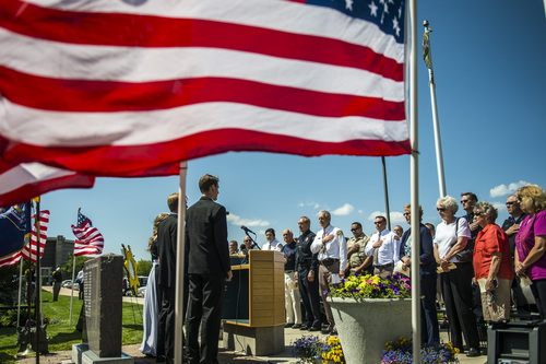 Chris Detrick  |  The Salt Lake Tribune
Members of the Skyline High School Madrigals sing the National Anthem during the Annual Memorial Service for fallen deputies and officers killed in the line of duty at the Sheriff's Office building Wednesday May 21, 2014.