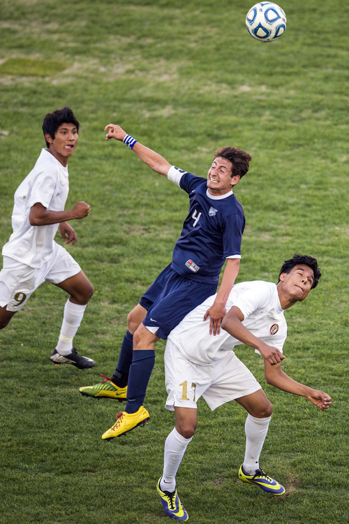 Chris Detrick  |  The Salt Lake Tribune
Skyline's Yanni Cayias (4) Logan's Alexis Magana (17) and Beto Rincon (9) go for the ball during the 4A Championship game at Rio Tinto Stadium Thursday May 22, 2014. Skyline defeated Logan 3-0.