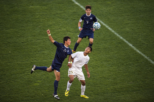 Chris Detrick  |  The Salt Lake Tribune
Skyline's Ben Wiscomb (17) and Logan's Anthony Martinez (25) go for the ball during the 4A Championship game at Rio Tinto Stadium Thursday May 22, 2014. Skyline defeated Logan 3-0.