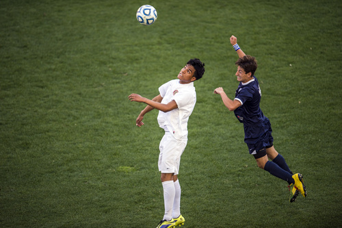 Chris Detrick  |  The Salt Lake Tribune
Logan's Alexis Magana (17) and Skyline's Yanni Cayias (4) go for the ball during the 4A Championship game at Rio Tinto Stadium Thursday May 22, 2014.