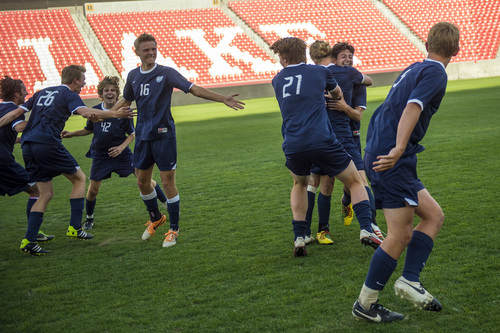 Chris Detrick  |  The Salt Lake Tribune
Members of the Skyline soccer team celebrate after winning the 4A Championship game at Rio Tinto Stadium Thursday May 22, 2014. Skyline defeated Logan 3-0.