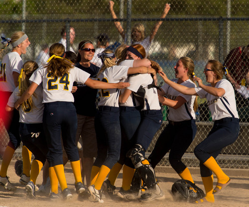 Trent Nelson  |  The Salt Lake Tribune
Bonneville players celebrate after defeating Spanish Fork High School in a 4A state softball tournament game Wednesday May 21, 2014.