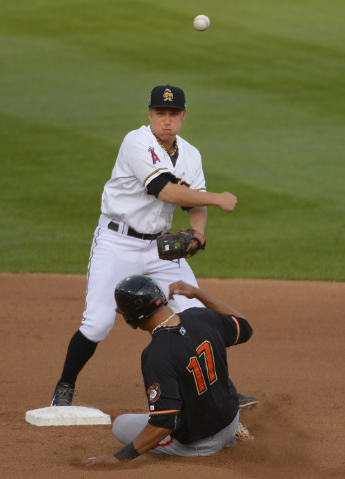 Leah Hogsten  |  The Salt Lake Tribune
Bees' Taylor Linsey outs Grizzlies' Chris Dominguez. The Salt Lake Bees host the Fresno Grizzlies Friday, May 23, 2014 at Smith's Ballpark.