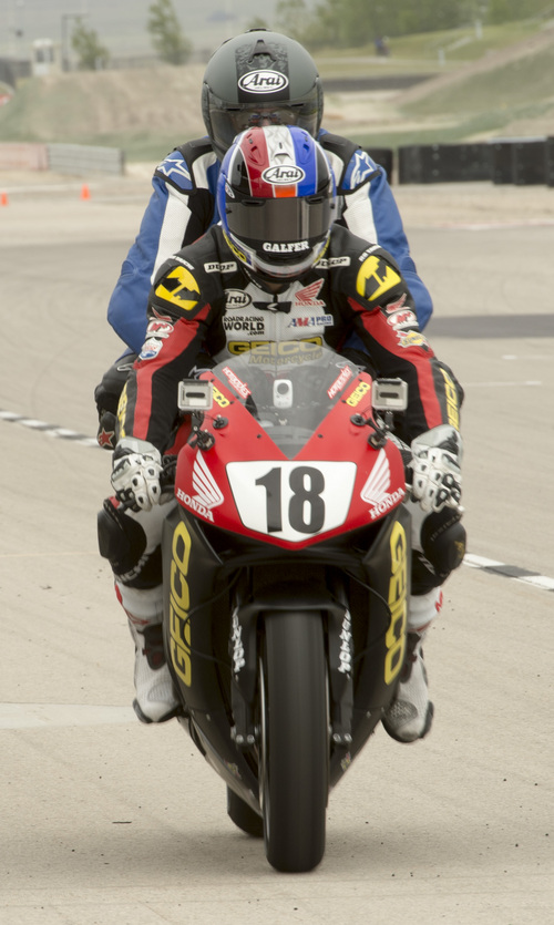 Rick Egan  |  The Salt Lake Tribune

Chris Ulrich, a top-level pro Superbike racer, gives a two-up ride, at Miller Motorsports Park, Friday, May 23, 2014.