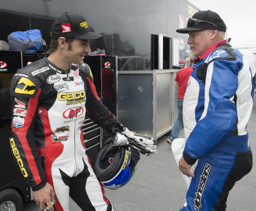 Rick Egan  |  The Salt Lake Tribune

Pro Superbike racer Chris Ulrich (left) jokes with Ron Duncombe (right) after his Superbike ride at Miller Motorsports Park, Friday, May 23, 2014.
