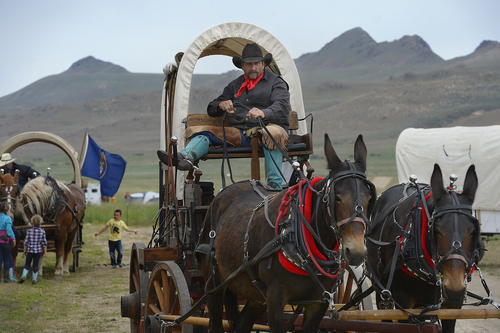 Scott Sommerdorf   |  The Salt Lake Tribune
Kelly Evans of Highland, waits for riders at the 10th Annual Cowboy Poetry and Western Music Festival at the Fielding Garr Ranch at Antelope Island State Park, Saturday, May 24, 2014.