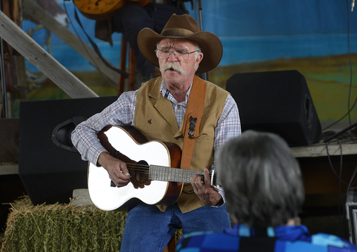 Scott Sommerdorf   |  The Salt Lake Tribune
David Anderson sings "Buckaroo Man" at the 10th Annual Cowboy Poetry and Western Music Festival at the Fielding Garr Ranch at Antelope Island State Park, Saturday, May 24, 2014.