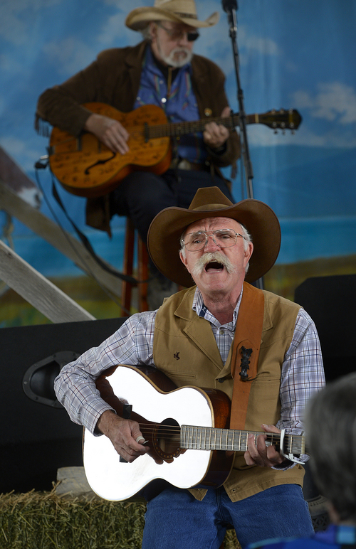 Scott Sommerdorf   |  The Salt Lake Tribune
David Anderson, below, sings "Buckaroo Man" at the 10th Annual Cowboy Poetry and Western Music Festival at the Fielding Garr Ranch at Antelope Island State Park, Saturday, May 24, 2014.