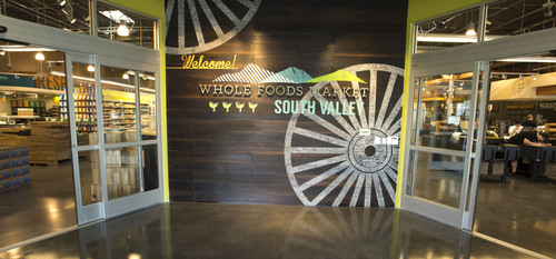 Steve Griffin  |  The Salt Lake Tribune

The entrance to the new Whole Foods Market opening in Draper, shown on Wednesday, May 21, 2014. The new, 35,000-square-foot store is the first Whole Foods in the country to have an in-house creamery for making ice cream. It's called the Scoop Creamery and one of its first signature ice creams is the "Draper Dandy."