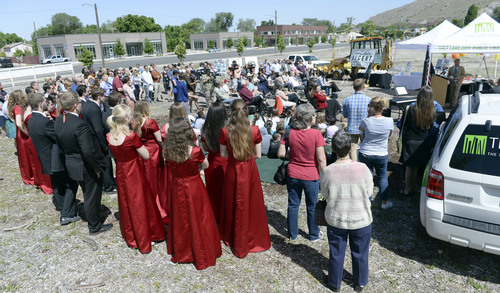 Al Hartmann  |  The Salt Lake Tribune
Neighborhood residents and students of the Marmalade neighborhood attend  a groundbreaking ceremony for the new Marmalade Branch of the Salt Lake City Public Library Thursday, May 29.   The future site of the building is now an open block on the corner of 500 North and 300 West. The construction is expected to be completed in the summer of 2015.