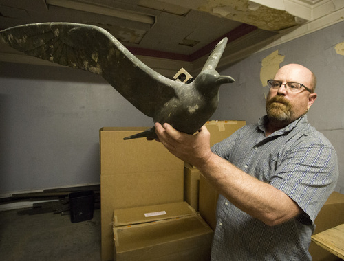 Rick Egan  |  The Salt Lake Tribune
Glen Richardson holds one of the bronze-coated seagulls, part of a sculpture recently removed from the old Prudential Federal building that is being demolished in downtown Salt Lake City to make way for the city's new performing arts center.