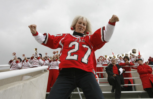 Rick Egan  |  Tribune file photo

"Bubbles", who fans sometimes call the "Crazy Lady", dances in the south bleachers between the 3 and 4th quarter during of a game against San Diego State in 2007.