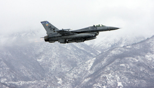 Francisco Kjolseth  |  The Salt Lake Tribune
An F-16 fighter pilot takes off from Hill Air Force Base in 2011.