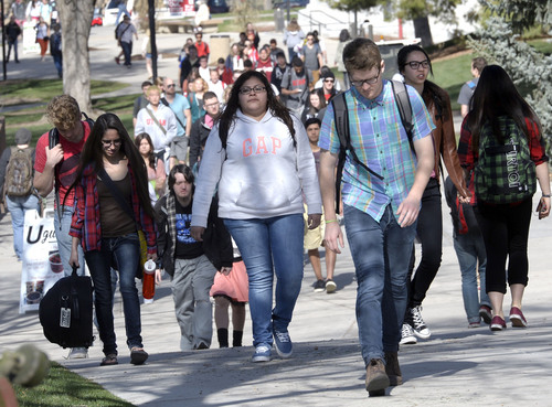 Al Hartmann  |  The Salt Lake Tribune
University of Utah students head to class on April 8.  The student government on Tuesday, April 22, 2014, voted to urge universityadministrators to change lyrics for the school's fight song, "Utah Man." Some lyrics of "Utah Man" can be considered sexist and racist.