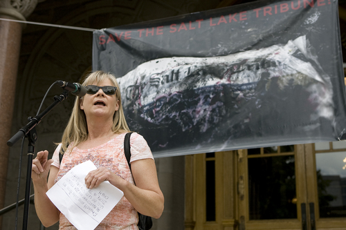 Melissa Majchrzak  |  Special to the Tribune
Joan O'Brien speaks to the crowd at the "Save the Tribune" rally, held at the City and County building in Salt Lake City on May 31, 2014.
