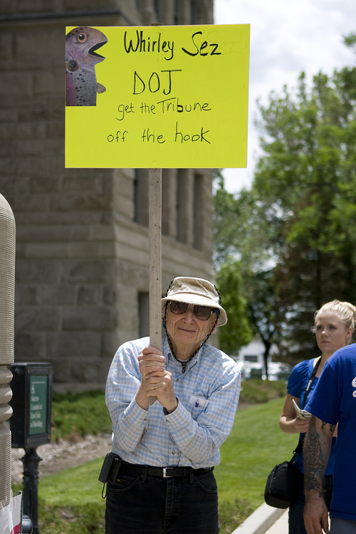 Melissa Majchrzak  |  Special to the Tribune
William Vogel holds a sign in support of the Salt Lake Tribune at the "Save the Tribune" rally, held at the City and County building in Salt Lake City on May 31, 2014.