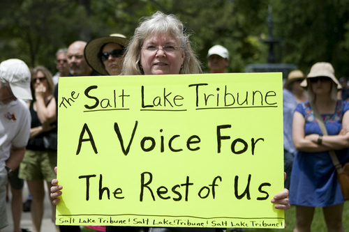 Melissa Majchrzak  |  Special to the Tribune
Pamela Thomas holds a sign in support of the Salt Lake Tribune at the "Save the Tribune" rally, held at the City and County building in Salt Lake City on May 31, 2014.