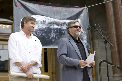 Melissa Majchrzak  |  Special to the Tribune
Kent Frogley and Tribune cartoonist Pat Bagley speak to the crowd at the "Save the Tribune" rally, held at the City and County building in Salt Lake City on May 31, 2014.
