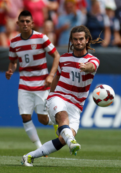 Trent Nelson  |  The Salt Lake Tribune
USA's Kyle Beckerman fields the ball as the United States faces Cuba in CONCACAF Gold Cup soccer at Rio Tinto Stadium in Sandy, Saturday July 13, 2013.
