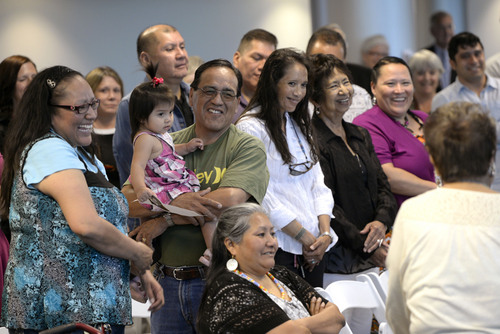 Al Hartmann  |  The Salt Lake Tribune
Friends, family, and members of the Ute Tribe gathered at the University of Utah Friday May 30 to announce a new law school scholarship for members of the Ute tribe in honor of David Arapene Cuch, who died in his third year of law school in 2007.  Members of the tribe laugh at a story told about Cuch by friend Maxine Natchees. The scholarship will be funded by his friends and family, which include former Utah Director of Indian Affairs Forrest Cuch.