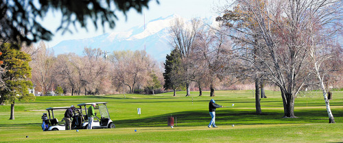 Al Hartmann  |  The Salt Lake Tribune
Early morning golfers play on the front nine holes at Rose Park Golf Course in Salt Lake City on Thursday. A new report reveals that Salt Lake City's golf courses lack financial viability. Among the money losers is the Rose Park 18-hole golf course. The consultant said the city should close it entirely or completely revamp it.