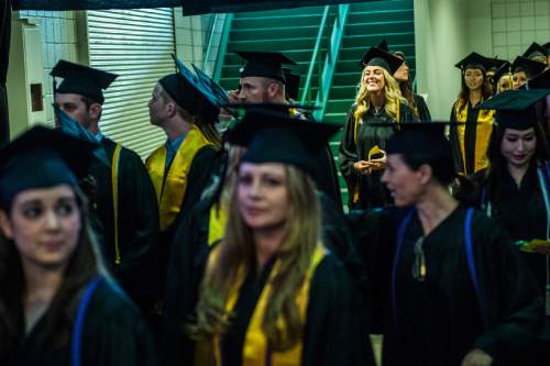 Chris Detrick  |  The Salt Lake Tribune
Westminster students walk into the Maverik Center before Westminster College's Commencement Saturday May 31, 2014. 977 students graduated.