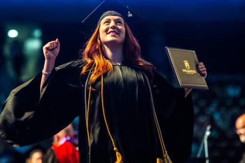 Chris Detrick  |  The Salt Lake Tribune
Aimée D'Ann Green celebrates after receiving her diploma during Westminster College's Commencement at the Maverik Center Saturday May 31, 2014. 977 students graduated. Green graduated Cum Laude with a bachelor of science in accounting.