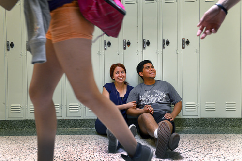 Leah Hogsten  |  The Salt Lake Tribune
Alexis Flores, 17, right, with girlfriend Vanessa Lagunas, 17, Wednesday, May 28, 2014 at Highland High. Both Flores, who plays football and rugby and Lagunas, who is junior class president and a cheerleader credit Highland High for pushing the two of them to excel.