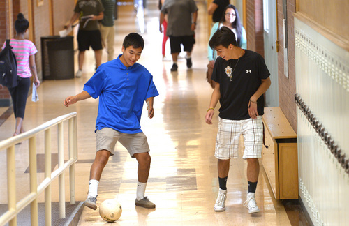 Leah Hogsten  |  The Salt Lake Tribune
l-r Highland High School soccer team players Mikey Morales, 17, and team captain Luis Orozco, 18, credit the teachers, coaches and staff for their attention and guidance in allowing the two to excel in school through good grades and personal achievement, Wednesday, May 28, 2014.
