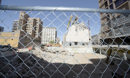 Al Hartmann  |  The Salt Lake Tribune
Hole in the ground on Regent Street in Salt Lake City will be the future home of the George S. and Dore' Eccles Theater.   Salt Lake City officials and benafactors broke ground for the new project at  Tuesday June 3.