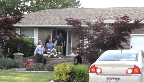 Rick Egan  |  The Salt Lake Tribune

FBI and state law enforcement agents leave John Swallow's residence in Sandy on Monday after searching the home for several hours. Monday, June 2, 2014