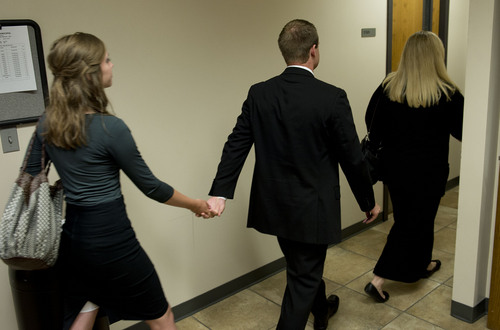 Jeremy Harmon  |  The Salt Lake Tribune

Nathan Fletcher leaves court with family members after he made his initial court appearance in Provo on Thursday, June 5, 2014. Fletcher is alleged to have sexually assaulted multiple women at BYU.