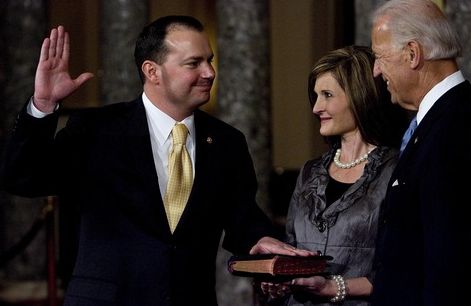 Djamila Grossman  |  Tribune file photo
Sen. Mike Lee, R-Utah, was sworn in last year by Vice President Joe Biden, as his wife, Sharon, holds the Bible. Getting the federal debt under control has been his No. 1 issue.