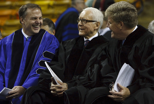 Leah Hogsten  |  The Salt Lake Tribune
U. S. Senator Orrin Hatch (center) and  Nike Brand President Charlie Denson (right), a USU alumni were both given honorary degrees during the undergraduate ceremony at the Dee Glen Smith Spectrum in Logan, Saturday, May 4, 2013.