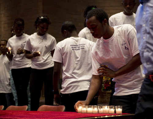 Lennie Mahler  |  The Salt Lake Tribune
Rwandan survivors light candles in memory of family members lost in the 1994 genocide of the Tutsi population. The Congregation Kol Ami in Salt Lake City hosted the event to observe the 20th anniversary of the genocide.