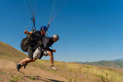 Trent Nelson  |  The Salt Lake Tribune
Blake Pelton and Luis Martinez take off as part of "Wings of Inspiration", an even created by Mike Semanoff to allow wounded and disable veterans to experience the thrill of paragliding, at the Point of the Mountain in Draper, Saturday June 7, 2014.
