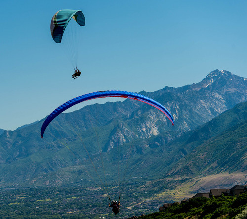 Trent Nelson  |  The Salt Lake Tribune
Paragliders take flight as part of "Wings of Inspiration", an even created by Mike Semanoff to allow wounded and disable veterans to experience the thrill of flight, at the Point of the Mountain in Draper, Saturday June 7, 2014.