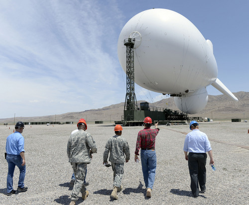 Al Hartmann  |  The Salt Lake Tribune
Officials from Raytheon and U.S Army battery tour the JLENS a last time at Utah Test and Training Range Tuesday June 10.    The JLENS which is 74 meters long will be moved from Utah to the Aberdeen Proving Ground in Maryland to integrate with NORAD.