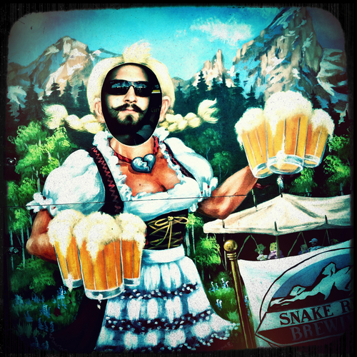 Chris Detrick  |  The Salt Lake Tribune
A reveler poses for pictures with a mural by Snake River Brewing Company during the 20th annual Mountain Brewers Beer Fest at Sandy Downs Race Track in Idaho Falls, Idaho Saturday June 7, 2014.
