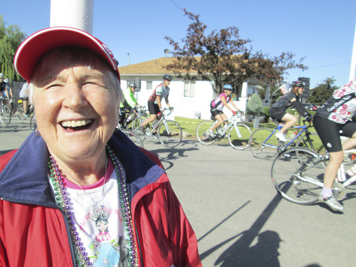 Kristen Moulton | Salt Lake Tribune

Alice Telford, founder of the Little Red Riding Hood all-women cycling ride, watches riders begin their long rides on Saturday, June 7, 2014, in Lewiston, Cache County. Telford, now 90, last rode in Little Red three years ago.