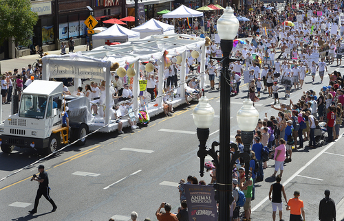 Scott Sommerdorf   |  The Salt Lake Tribune
The Just Married float passes down 200 South at the Salt Lake City Pride Parade, Sunday, June 7, 2014.
