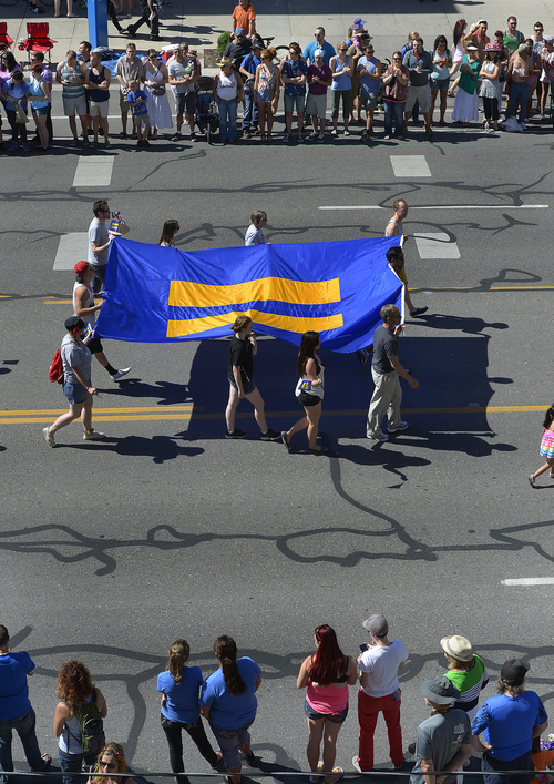 Scott Sommerdorf   |  The Salt Lake Tribune
The Equality flag is paraded at the Salt Lake City Pride Parade, Sunday, June 7, 2014.