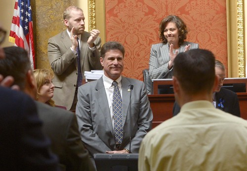 Leah Hogsten  |  The Salt Lake Tribune
Rep. Jim Dunnigan, R-Taylorsville, chairman of the investigative committee, and fellow legislators on the committee are applauded for their efforts after presenting their final report, Wednesday, March, 12, 2014, to the Utah House, into former Attorney General John Swallow.  A stack of more than 200 pages with 3,700 exhibits was submitted as the result of a four-month, $4 million investigation, which contributed to Swallow's resignation.