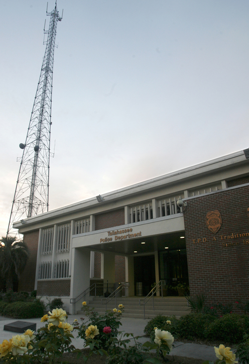 This photo taken June 11, 2014 shows a communications tower behind the Tallahassee Police Department in Tallahassee, Fla. The department has used the "Stingray" surveillance device, which masquerades as a cell phone tower, to intercept mobile phone calls. The Obama administration has been quietly advising local police not to disclose details about surveillance technology they are using to sweep up basic cellphone data from entire neighborhoods, The Associated Press has learned. (AP Photo/Phil Sears)